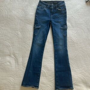 American Eagle, flared jeans, dark blue, with buttoned pockets on side and back